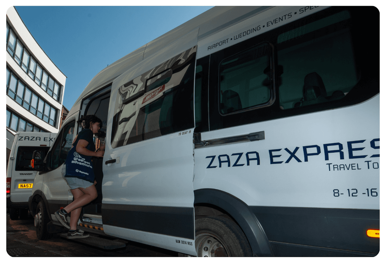 ZAZA Express 16-seater minibus with a passenger boarding